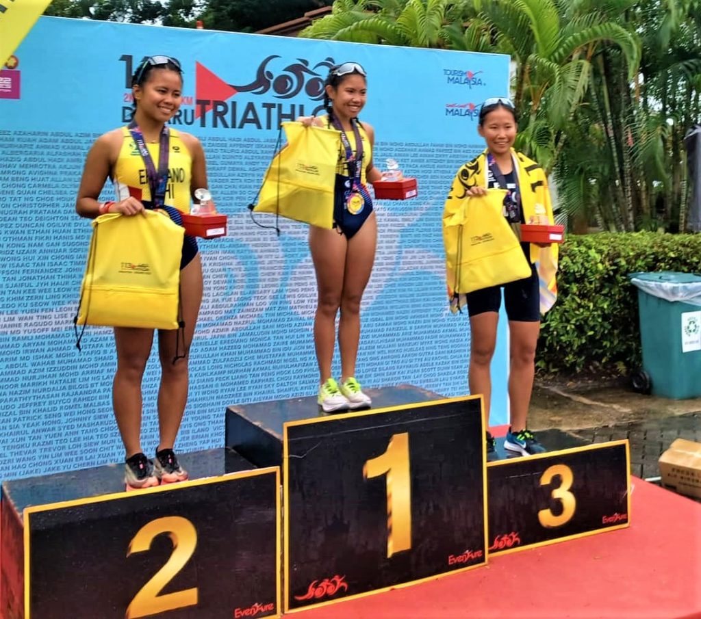 Cebuana athlete Moira Frances Gabrielle Erediano (left) joins Katrina Salazar (middle) and Malaysia's Teo Sze Hui (right) at the podium during the awarding ceremony of the Southeast Asian Triathlon Association (SEATA) Race on September 18, 2022. | Contributed Photo.