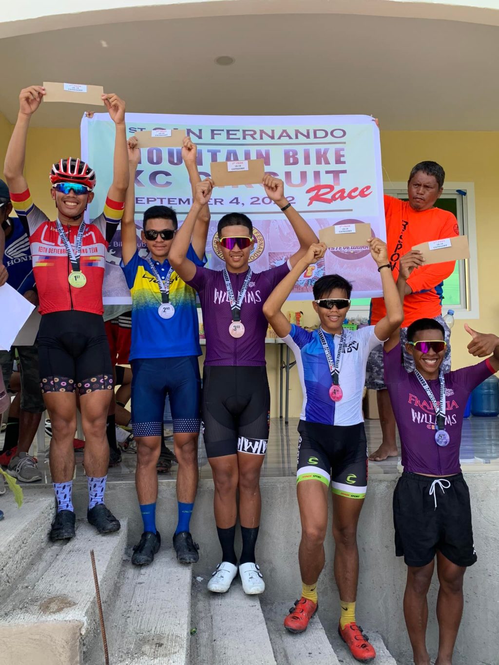 Khalil Sanchez (extreme left) poses with the other podium finishers in the open category of the inaugural San Fernando XC-Circuit Race last weekend.