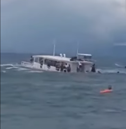 The Coast Guard and the Local Disaster Risk Reduction and Management Office personnel of Cordova town rescue 35 person from an island hopping pump boat which sank off the coast of Cordova town in Mactan Island on Sept. 25. | Contributed photo