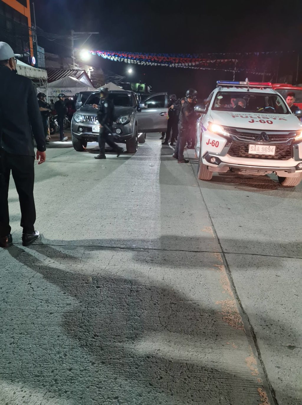 Police arrest Police Captain Adulfo Abrigana Jr. of the Cebu Port Authority past midnight Tuesday, September 6, after he was accused of indiscriminately firing his 9 mm pistol near the Barangay Hall of Brgy. San Roque, Cebu City. | Contributed photo