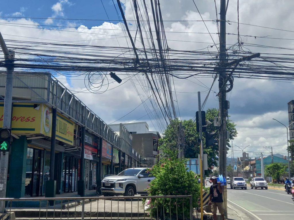 Clearing, bundling spaghetti, hanging wires starts Sept. 19 -- Mandaue exec. S.B Cabahug St. corner of A.C Cortes Avenue will be the first portion of Mandaue City, where the hanging, spaghetti wires will be cleared and bundled starting Monday, Sept. 19. | Mary Rose Sagarino
