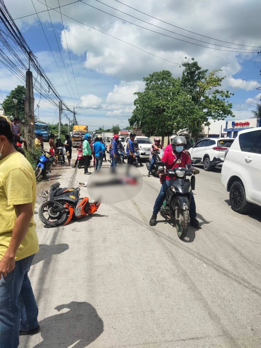 Motorcycle driver dies after he got ran over by truck in Lacion. Placido Abris dies after he was ran over by a truck when his motorcycle slipped on a slippery portion of the road and he fell on the road in Consolacion town at past noon today, Sept. 15, 2022. | Contributed photo via Paul Lauro