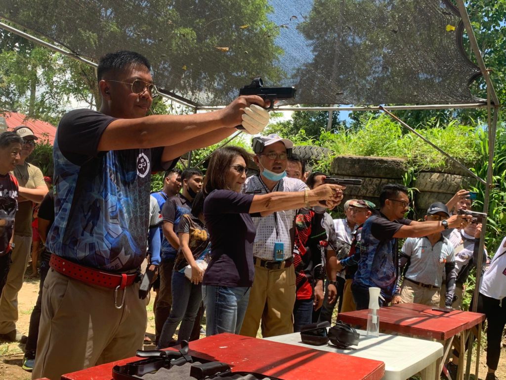 Cebu Governor Gwendolyn Garcia does the ceremonial shooting to kick off the CFBJ Shoot-for-a-Cause event at the Front Sight Gun Club Inc. in Barangay Tubod, Minglanilla, on Sunday, September 11. | Pegeen Maisie Sararaña