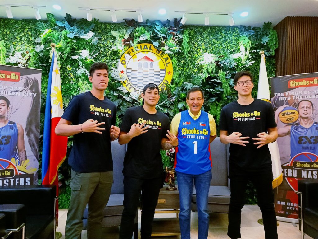 Cebu's 3x3 pride Dave Ando (left), Mac Tallo (second from left), and Zach Huang (right) make a courtesy call on Cebu City Mayor Michael L. Rama (center) at the Cebu City Hall on Friday, Sept. 23, 2022. | Glendale G. Rosal