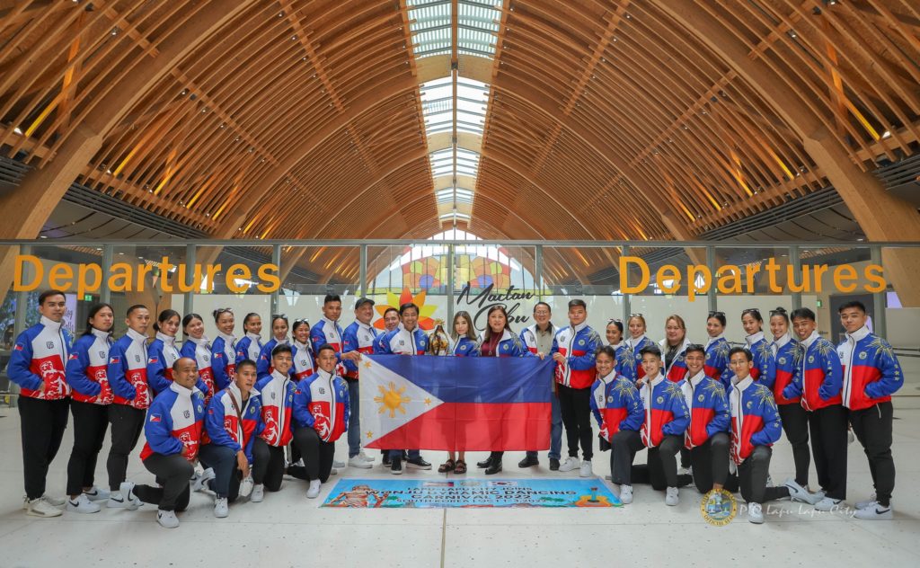 The Lapu-Lapu City Performing Arts (LLCPA) takes time for a group photo before flying to South Korea. | Futch Anthony Inso