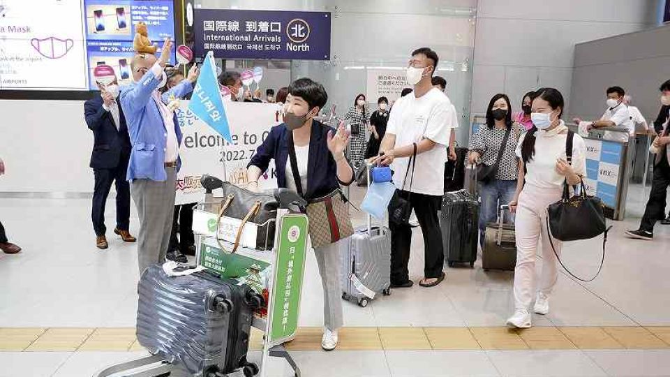 Japan plans to scrap cap on international arrivals