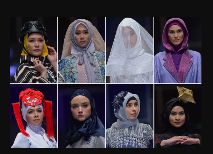 (FILE) This picture taken on April 20, 2018 shows models presenting hijab creations by Indonesian designers on the second day of the Muslim Fashion Festival in Jakarta. The Muslim Fashion Festival is held from April 19 to 22. / AFP PHOTO / Adek BERRY