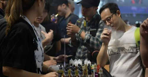 e-cigarette users for story:China to impose consumption tax on e-cigarettes starting Nov