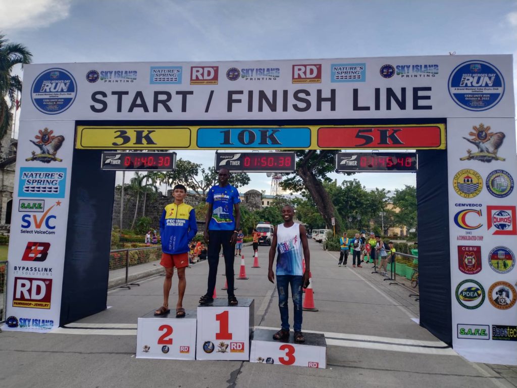 Erick Chipsiror (top of the podium) poses with fellow winning runners in Jerome Casinillo (2) and Leonard Kimboie (3). | Contributed Photo.
