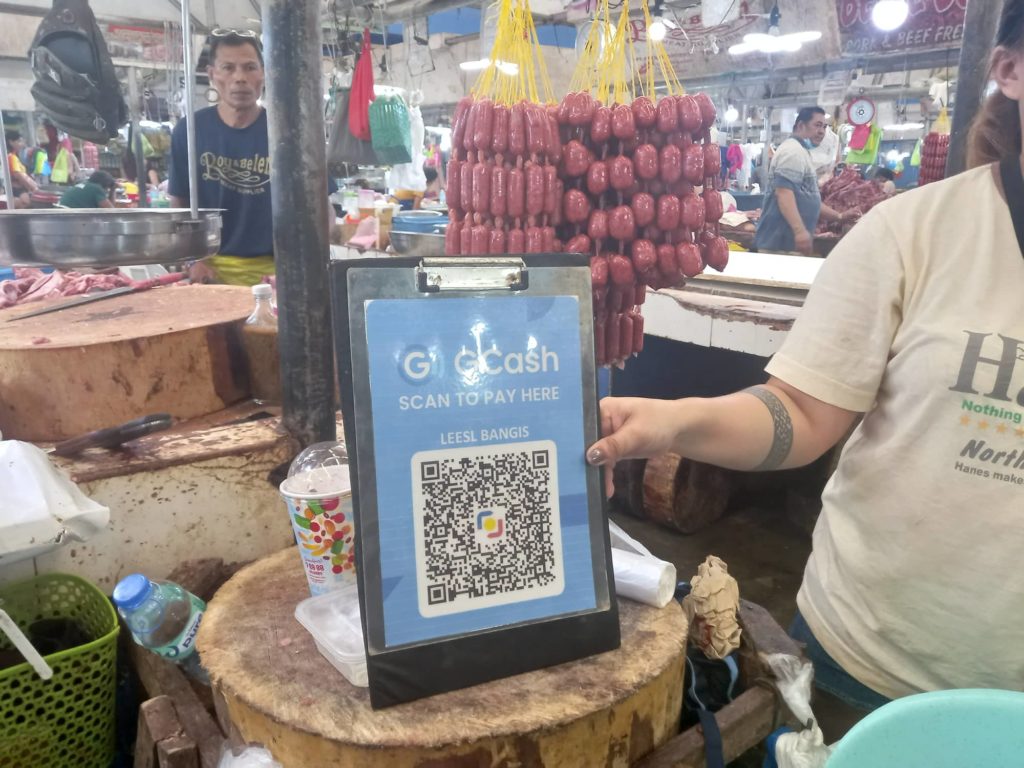 More vendors at the Mandaue City Public Market have gone digital. | Mary Rose Sagarino