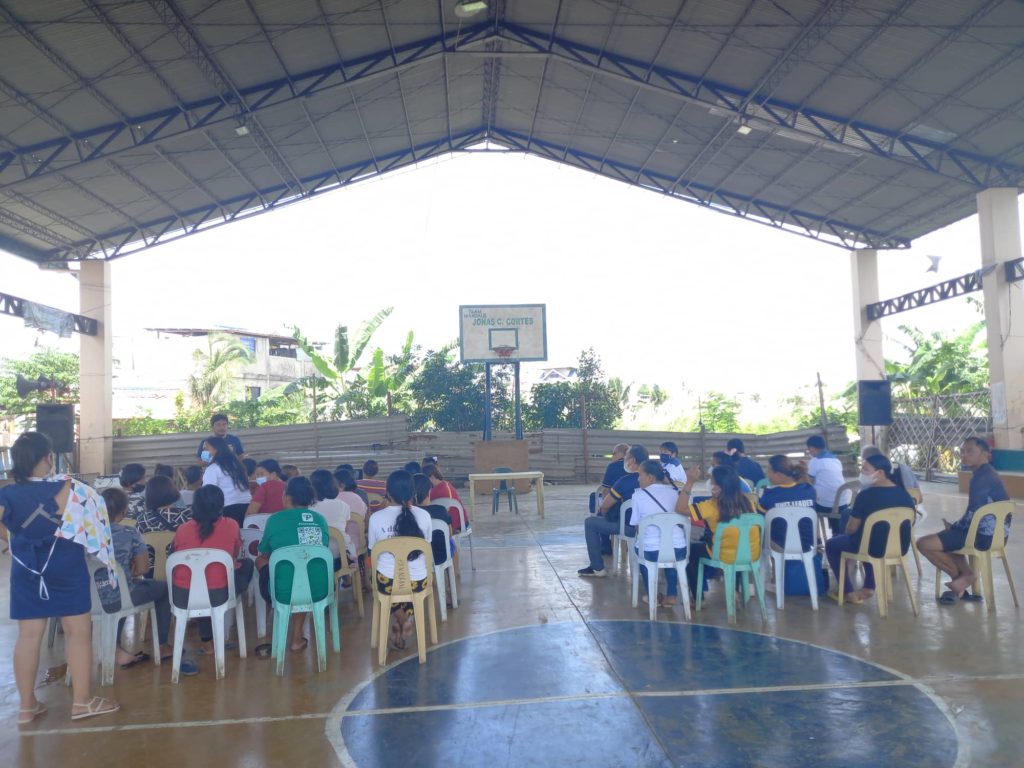 Representatives of the Department of Public Works and Highways hold a consultative meeting with the affected families on the Mandaue side of the bridge project on Oct. 12 and 13. | Mary Rose Sagarino