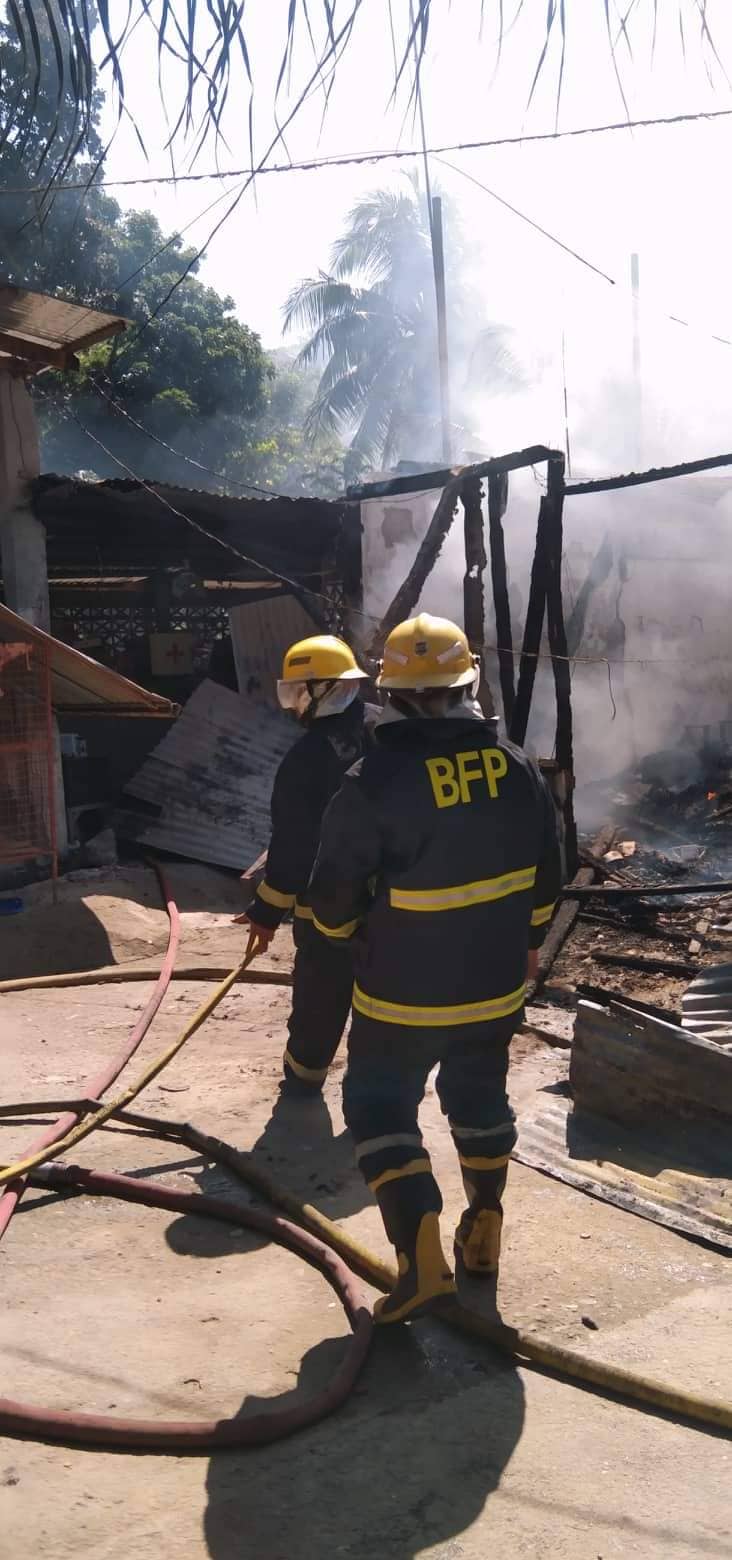 Firefighters of the Tuburan Fire Station say that they put out the fire that destroyed two houses in Tuburan town at 12:35 p.m. today or 30 minutes after it was reported. | Contributed photo via Paul Lauro