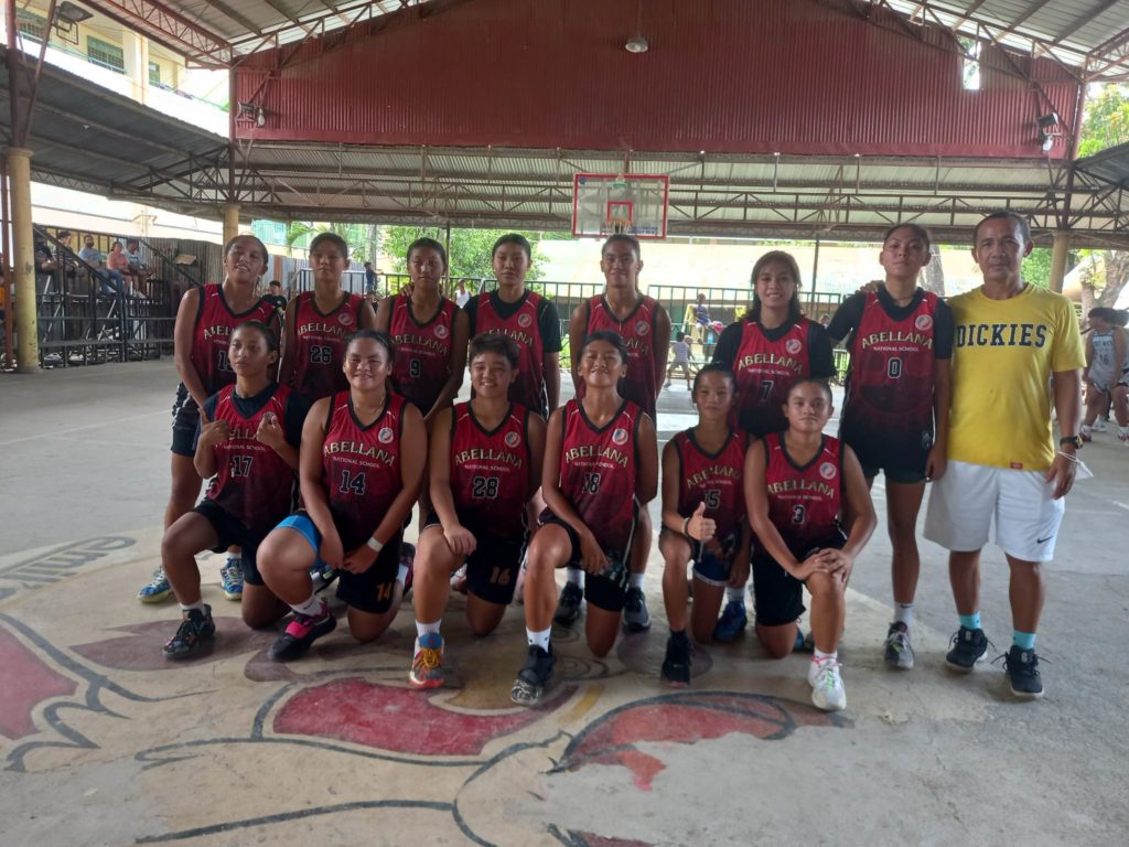 The Abellana National School (ANS) girls basketball team poses for a group photo after winning their first game in the MGBL. | MGBL photo