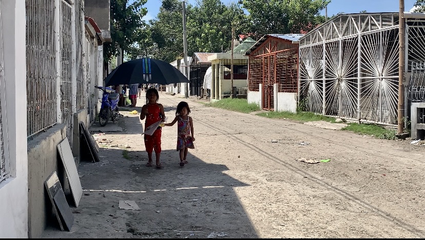 Cebuanos who find comfort living inside cemeteries. In photo are two kids, who have already considered the Carreta Cemetery as their home for years.