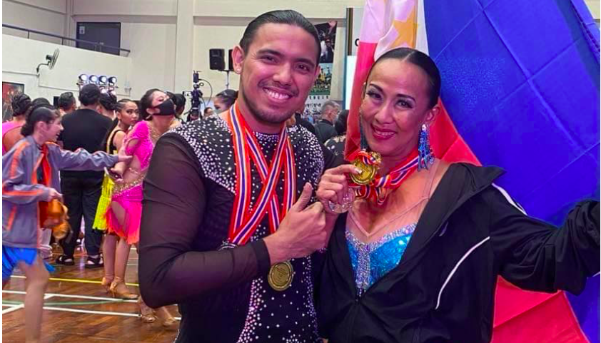 Anselmo Estillore Jr. (left) and Eleanor Hayco (right) show the gold medal they have won in the LKDSA Open Dancesport Championship in Kuala Lumpur, Malaysia on Saturday, October 8, 2022. | Contributed Photo