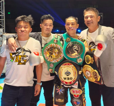 Reymart Gaballo wears the boxing titles around his waist and shoulders, while being surrounded by his promoters after knocking out Ricardo Sueno on Saturday evening, Oct. 29, 2022. | Sanman Boxing Facebook page