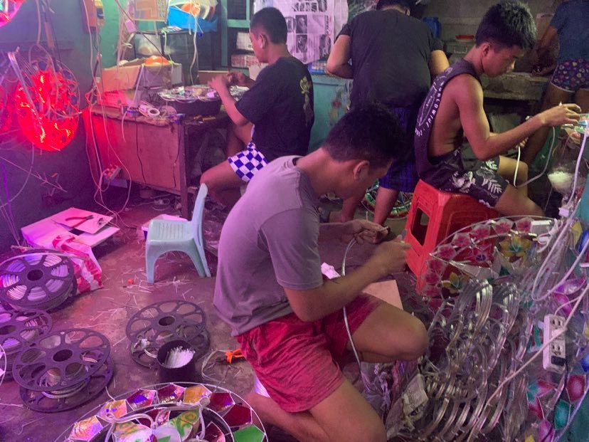 Birchman Bucad says that the Bucad family now employ 20 people to help them assemble the Christmas lanterns for sale her i Cebu. | Wenilyn B. Sabalo