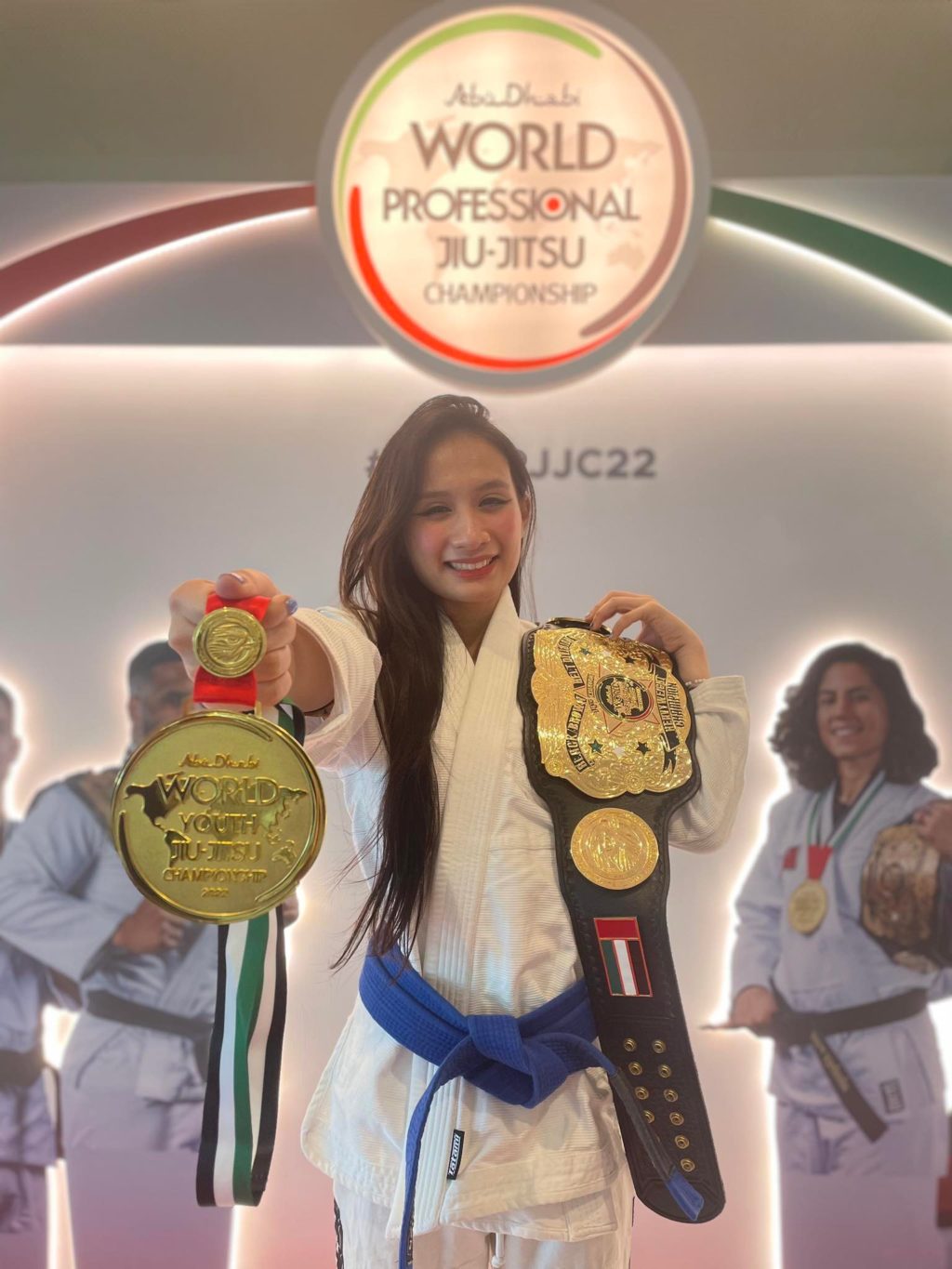 Eliecha Malilay showing her gold medal and the world champion's belt of the 14th Abu Dhabi World Youth Jiu-Jitsu Championships. | Photo courtesy of Dante Malilay via Glendale G. Rosal