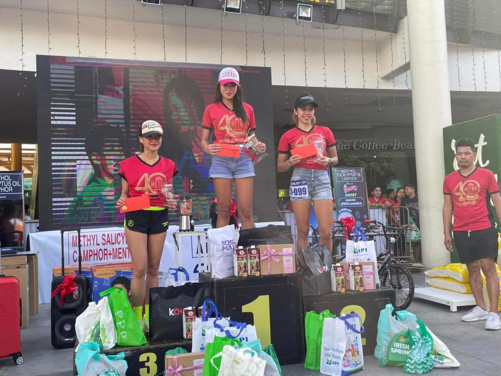 Cherry Andrin (center) wins the 21-kilometer half marathon women's category of Metro @40 Ruby Fun Run Sunday, on Nov. 6, 2022, at the Ayala Center Cebu Terraces. | Photos courtesy of Enbee Tagalog