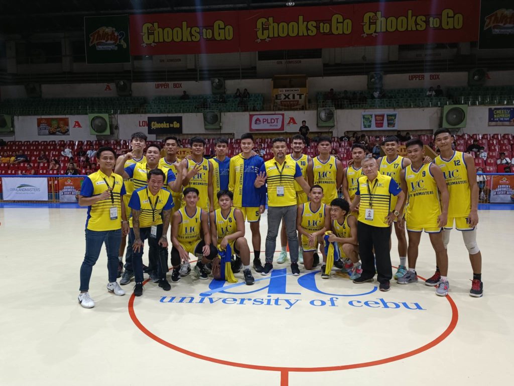 The officials and players of UC Main take time for a photo after they routed the UCLM in their Cesafi high school basketball game at the Cebu Coliseum. | Glendale G. Rosal