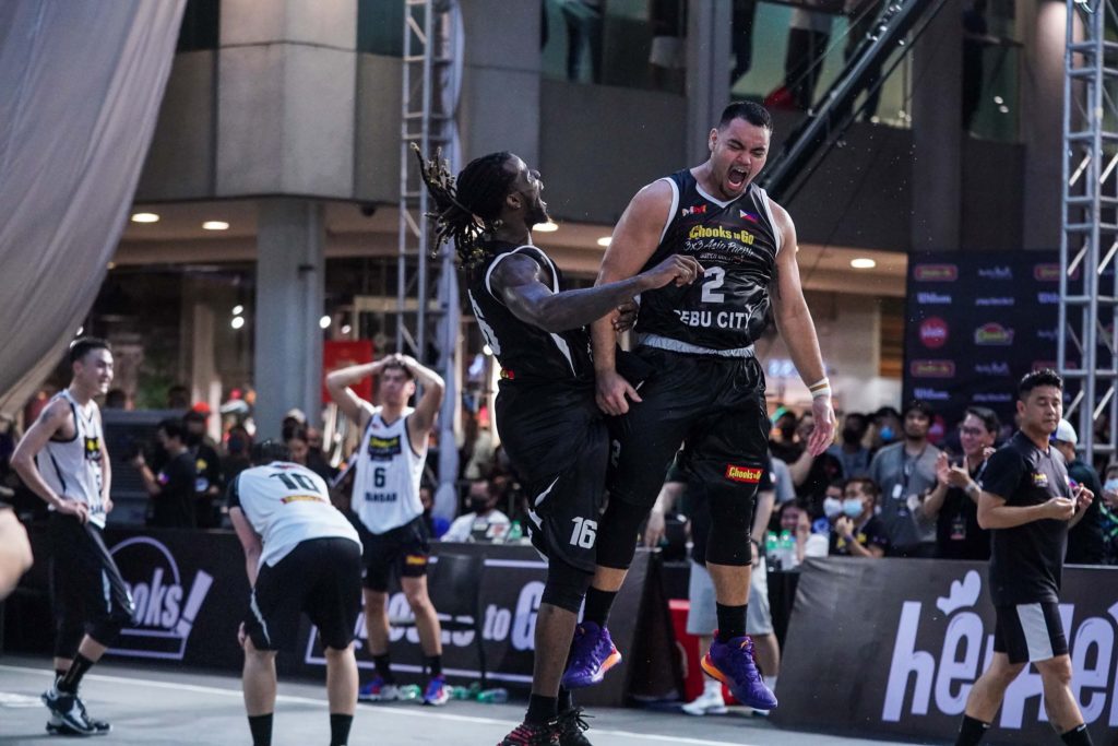 Mike Nzeusseu (left) and Brandon Ramirez (right) celebrates during their campaign in the 2022 Chooks-to-Go FIBA 3x3 Asia Pacific Super Quest,at the Ayala Malls Solenad Activity Center in Laguna last April.