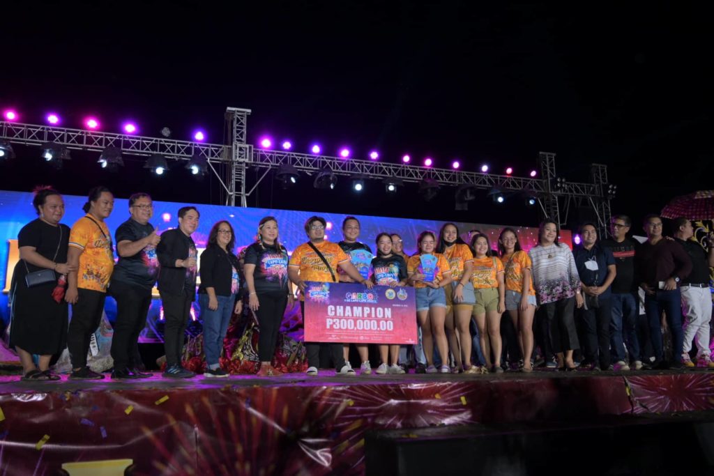 The Barangay Maribago contingent receives the P300,000 cash prize for winning the best in ritual showdown of the Garbo sa Lapu-Lapu on Saturday, Nov. 19. | Futch Anthony Inso