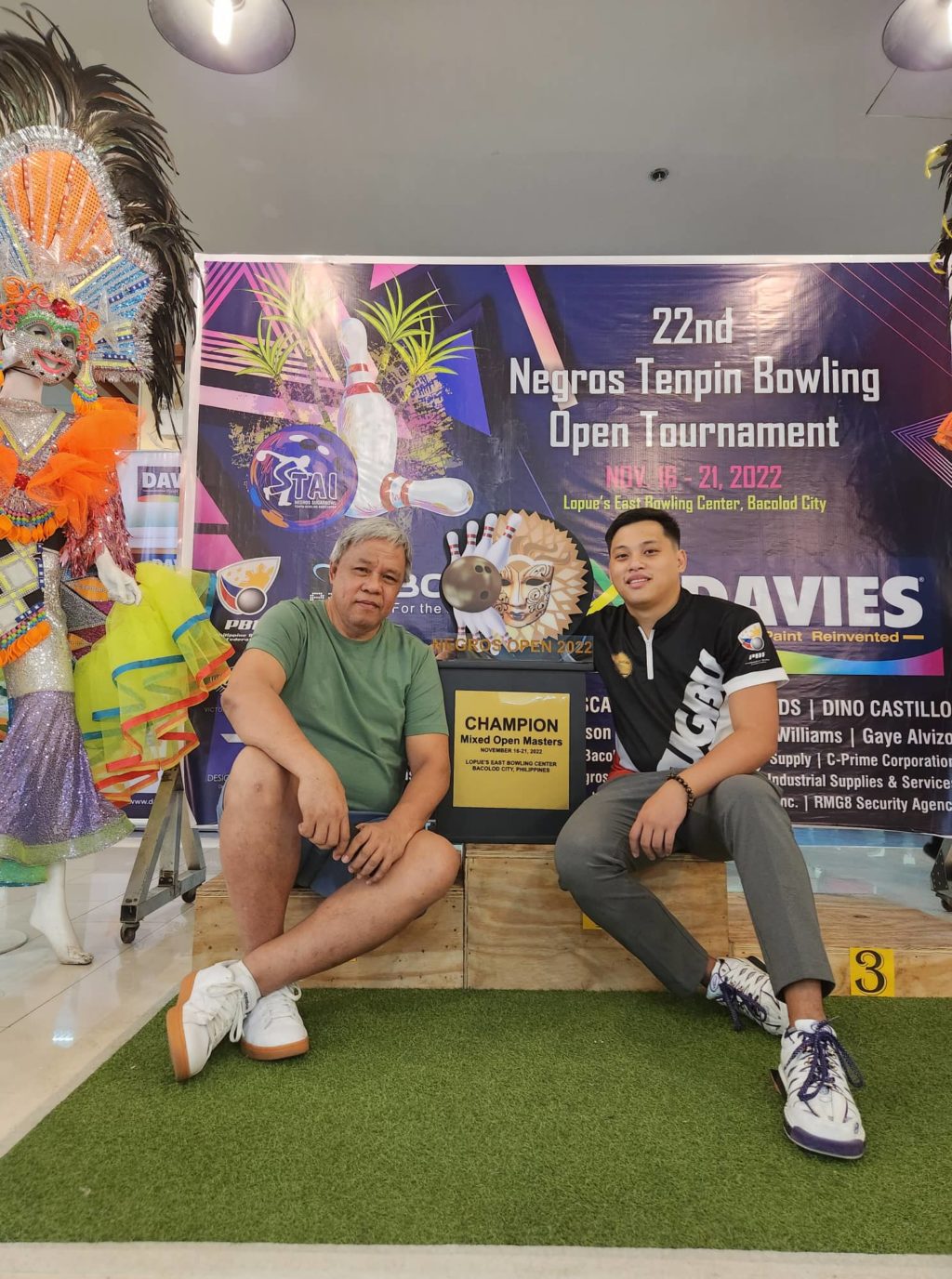 SUGBU president Edgar Alqueza (left) and his son Heber Alqueza (right) pose with the trophy that the latter earned for topping the mixed open masters of the Negros Tenpin Bowling Open Tournament in Bacolod City. | Contributed Photo.