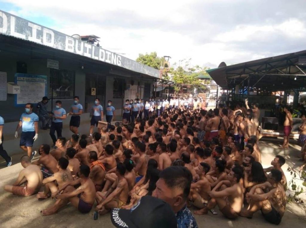 Inmates of the Lapu-Lapu City Jail male dormitory stay in an open space at the facility while waiting for the Greyhound operation to be done. | Josephus Quijano via Futch Anthony Inso