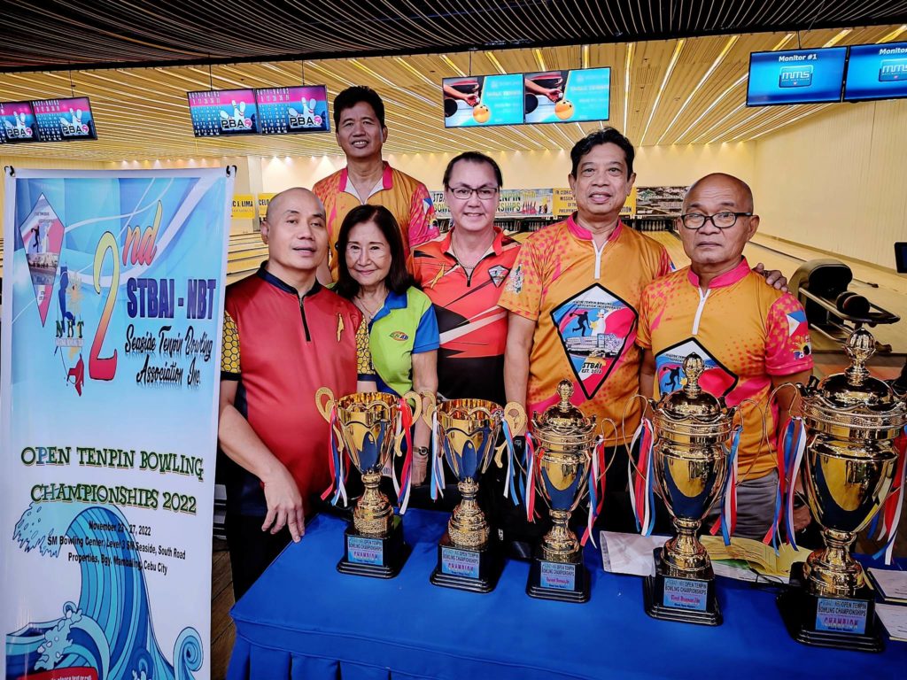 The members of the STBAI pose for a group photo with the tournament's trophies during the 2nd STBAI Open Tenpin Bowling Championships at the SM Seaside City Cebu Bowling Center. | Glendale Rosal