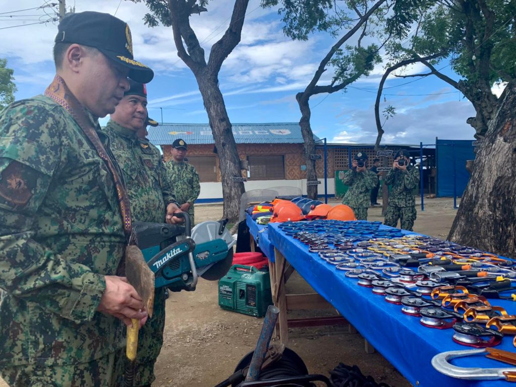 Police Brigadier General Roderick Augustus Alba inspects the tools and equipment of the Regional Mobile Force Battalion in Central Visayas in its headquarters in Sibonga town, southern Cebu. | Pegeen Maisie Sararaña