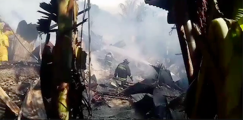 Firefighters, who are battling the fire that hit Sitio Dakit in Barangay Guadalupe, Cebu City at nearly 1 p.m. today, Nov. 25, have placed the fire under control at 1:24 p.m. and declared fire out at 1:27 p.m. | via Paul Lauro