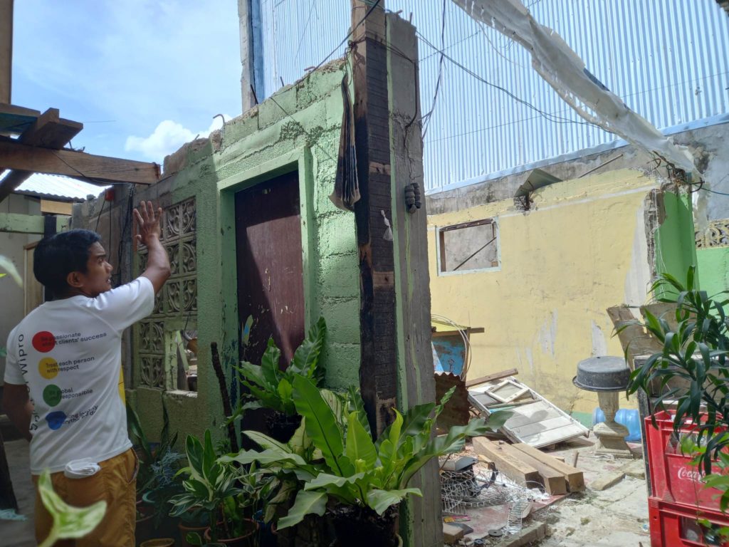 Harold Bantigue shows where the family were when tragedy struck at the height of Super Typhoon Odette last Dec. 16, 2021. | Mary Rose Sagarino
