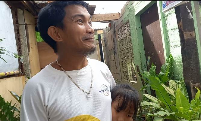 The burden that a husband and father has to carry for losing his wife, daughters to Odette. In photo is Harold Bantigue, who still carries the pain and helplessness to help his wife and daughters from dying from being pinned from the collapsed wall caused by the winds of super typhoon Odette last Dec. 16, 2021. | Mary Rose Sagarino