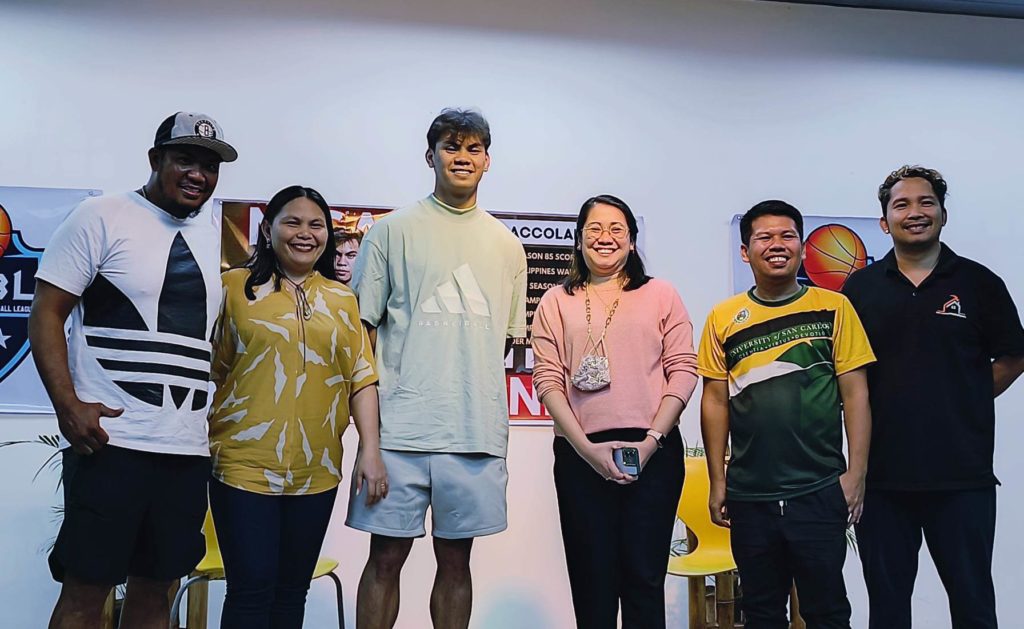 Cebuano cager, who now plays for UST, visits Cebu school where his basketball journey started. In photo are Dominic Cabañero, Annalene Cabañero, Nicael Cabañero, USC-NC principal Rovelyn C. Mina, USC sports coordinator Galimar Largo, and G-Sports founder Gerry Canonigo, who pose for a photo during the UAAP cager's visit to his former school, the USC-NC. | By Glendale Rosal.