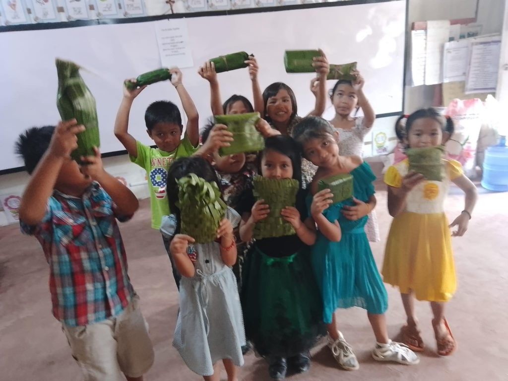 Teacher Annalie says letting her 10 Grade 2 students wrap their Christmas gifts with banana leaves helps them to realize that there is happiness in simplicity. | Annalie Gantuangco