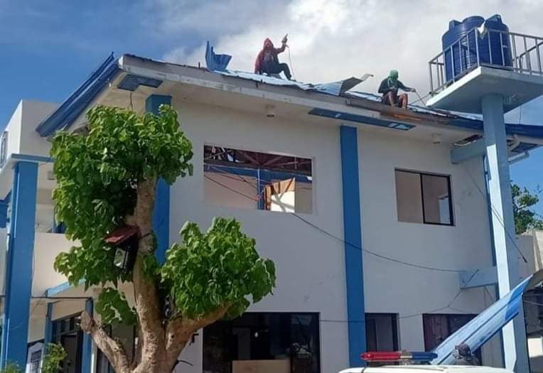 After two months of focusing on helping the community to get back on its feet from the Dec. 16, 2021 devastation of Super Typhoon Odette, the policemen finally turned to work on their damaged police station. | Photo courtesy of Police Major Mike Gingoyon