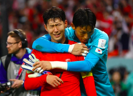  December 2, 2022 South Korea’s Son Heung-min and Kim Seung-gyu celebrate after the match as South Korea qualify for the knockout stages REUTERS/Matthew Childs