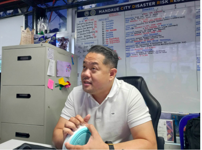 Education campaign on heavy rains, Christmas lights to be held this week — Mandaue DRRMO. Buddy Alain Ybañez, CDRRMO head of Mandaue, says will conduct an information drive on things such as what to do when possible heavy rains will happen. | Mary Rose Sagarino (FILE PHOTO)