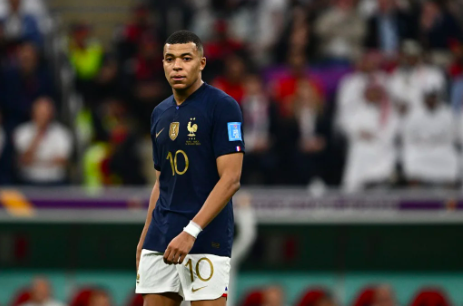 France’s forward #10 Kylian Mbappe looks on during the Qatar 2022 World Cup semi-final football match between France and Morocco at the Al-Bayt Stadium in Al Khor, north of Doha on December 14, 2022. (Photo by GABRIEL BOUYS / AFP)