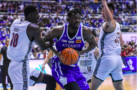 Ateneo center Ange Kouame tries to score against two UP defenders in Game 3 of the UAAP Season 85 men’s basketball Finals. UAAP PHOTO (INQUIRER FILE PHOTO)