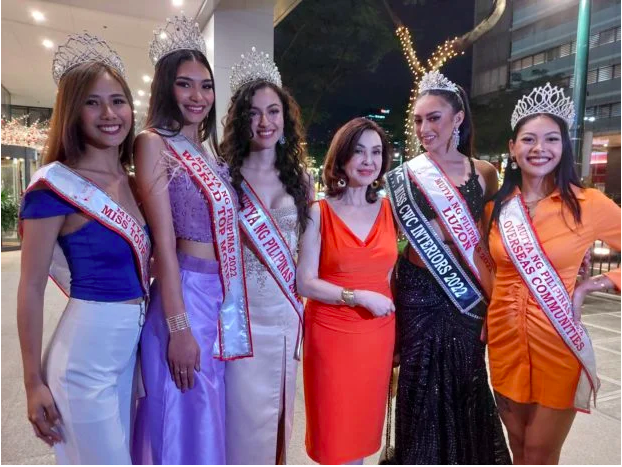 Mutya ng Pilipinas President Cory Quirino (third from right) is flanked by her reigning queens (from left) Jeanette Reyes, Arianna Padrid, Iona Gibbs, Shannon Robinson and Jesi Mae Cruz. Image: Philippine Daily Inquirer/Armin P. Adina