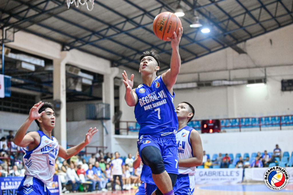 Lance Sabroso soars high for a layup during their game against Region V in the ongoing BPBL grand finals in Manila. 