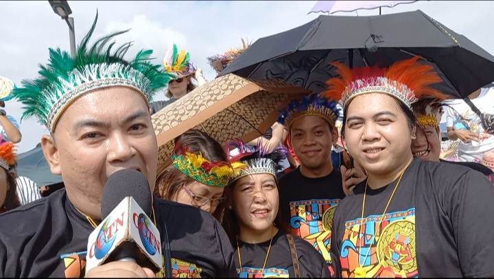 Spectators on Sinulog 2023: It was a fun, colorful experience. A group of friends from Binangonan, Rizal enjoy the Sinulog 2023 at the South Road Properties today. | Mary Rose Sagarino