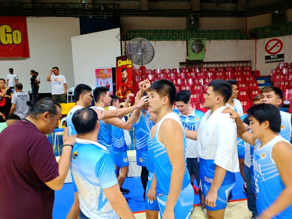 UNBL All Stars huddle up after beating the UC Webmasters on Friday in the Sinulog Basketball tilt. | Glendale Rosal