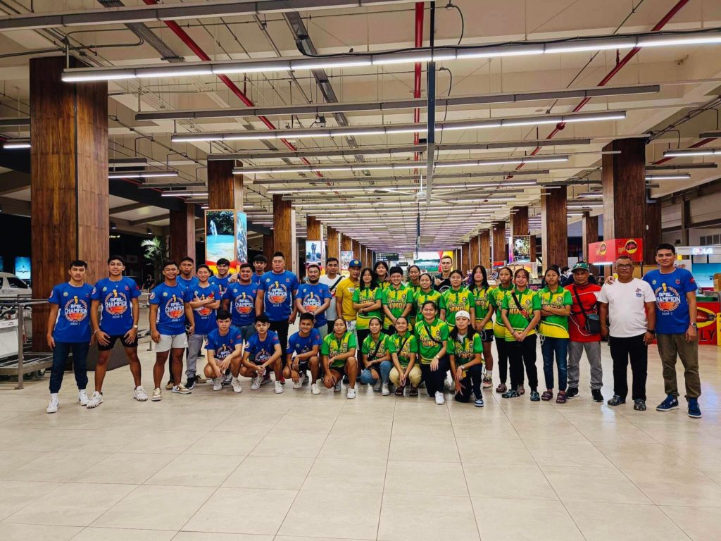 Region VII boys, girls basketball teams in Manila for Batang Pinoy national finals. IN photo are Sambag 2 FBA (in blue shirt) and the ANS girls basketball teams (in green shirt) posing for a group photo along with their coaches and team officials at the Mactan Cebu International Airport prior to their flight to Manila for the BPBL National Finals. | Photo from Sandi Grumo
