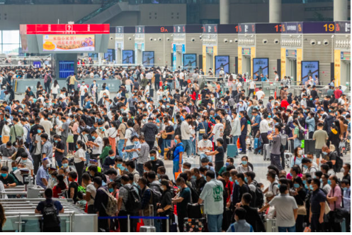 90% of people in China province infected with COVID-19–official. Passengers crowd Zhengzhou East Railway Station one day ahead of the National Day holidays, in Zhengzhou in China’s central Henan province on September 30, 2022. (Photo by AFP) 