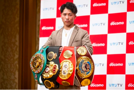 Boxer Naoya Inoue poses for photographs during a press conference in Yokohama on January 13, 2023. (Photo by Yuichi YAMAZAKI / AFP)