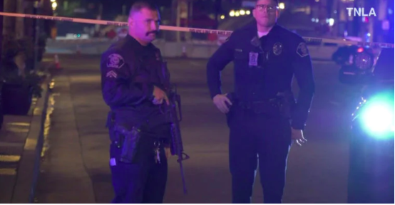 Screenshot from a viodeo shows police officers standing guard at the scene of a shooting at Monterey Park, California, U.S. January 22, 2023. TNLA/Handout via REUTERS