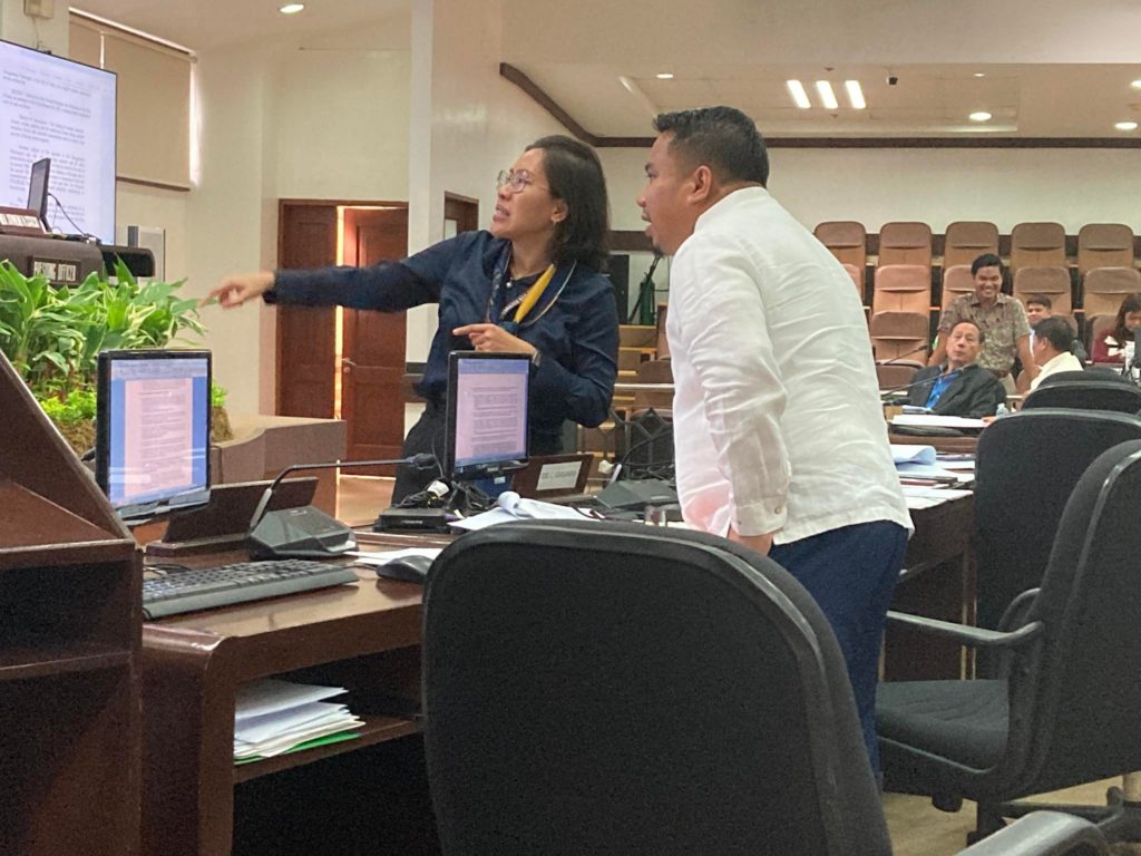 The StRAW Ordinance pushed by Cebu City Councilor Rey Gealon (right, foreground) is discussed during a public hearing on Feb. 1, 2023 at the City Council session hall. With him is Cebu City Council Secretary Charisse Piramide (right, foreground). | Jessa Ngojo