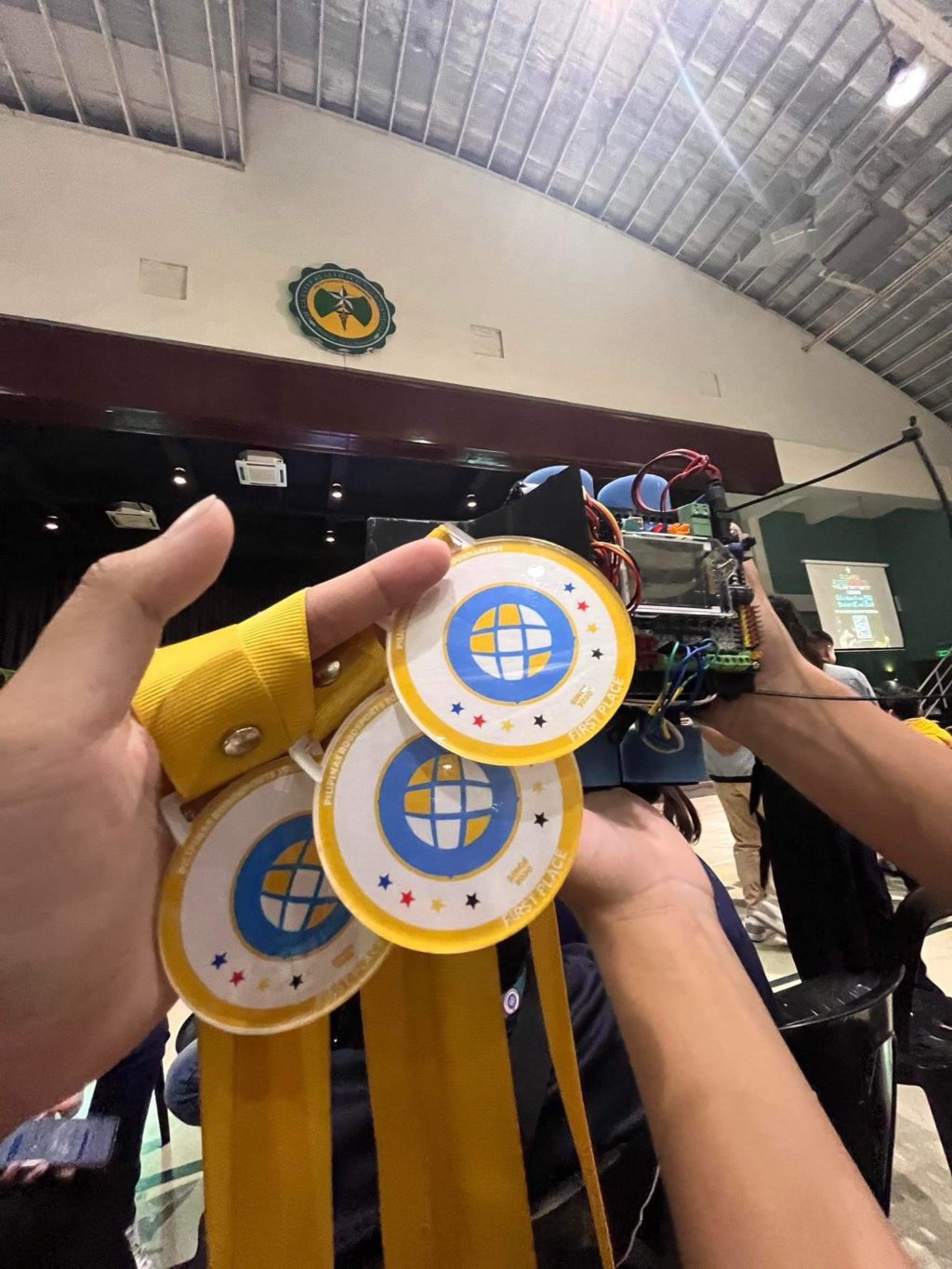 Yhen Meagan Sitee and three of her junior high school classmates of the City of Bogo Science and Arts Academy win gold medals in the RoboSports Tournament in Dasmariñas City in Cavite on Feb. 4, 2023. | Contributed photo